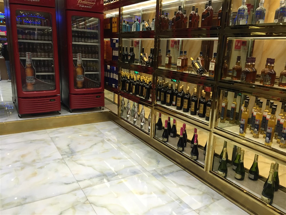 KTV公共区采用金艾陶瓷砖微晶石西班牙-翡翠玉KWD58001铺贴